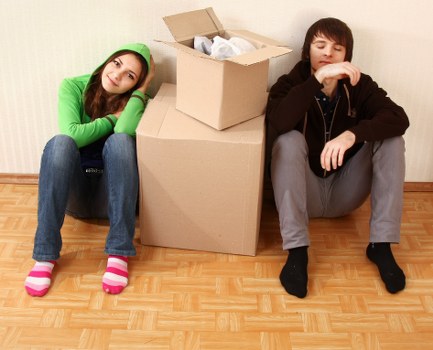 Local moving team handling boxes and furniture in Becontree