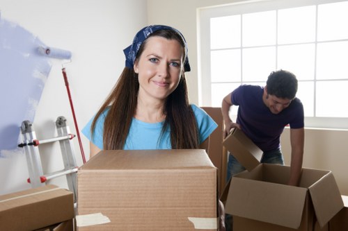 Local moving team packing household belongings in Becontree